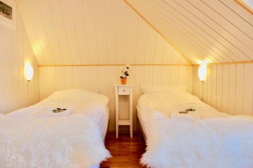 Postel nebo postele na pokoji v ubytování Guesthouse Árný