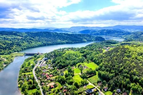an aerial view of a river and a town at Dunajec Mansion in Czchów