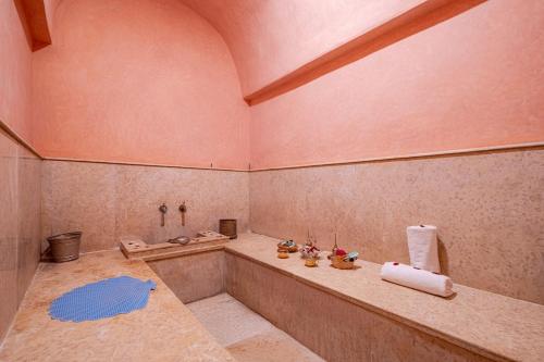 a large bathroom with a tub and a sink at Luxury Palace in Marrakesh in Marrakesh