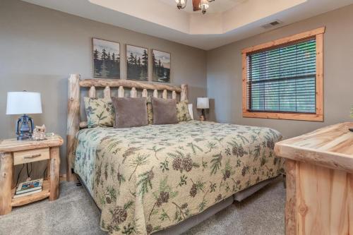 a bedroom with a bed and a window at 1BR Village At Indian Point 501 near SDC-Free Tickets Daily up to $500 in Branson