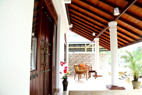 Balkón nebo terasa v ubytování Nivahana Homestay