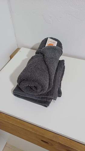 a towel sitting on top of a white table at Departamento Salomé in Eduardo Castex