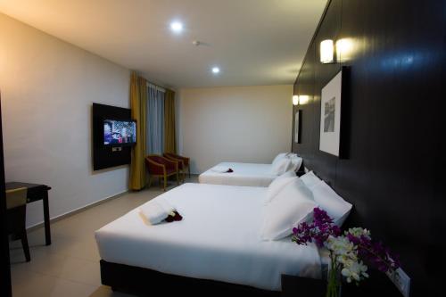 Televisyen dan/atau pusat hiburan di Akar Hotel Jalan TAR