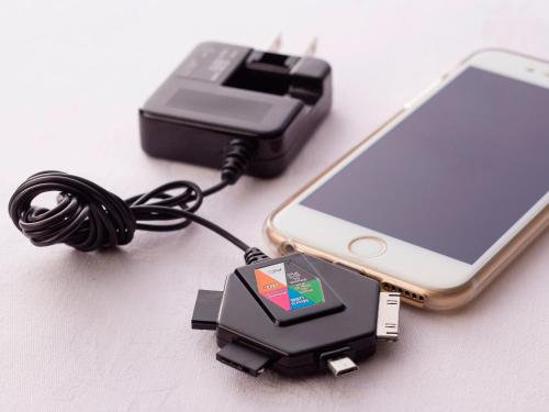 a cell phone being hooked up to a charger at Ark Hotel Osaka Shinsaibashi -ROUTE INN HOTELS- in Osaka