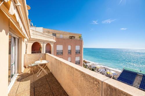 a balcony with a view of the ocean at Victoria Sole & Mare with Sea View Terrace - Happy Rentals in Menton