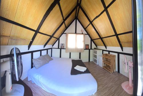 a bedroom with a bed in a tent at La Lune's Koh Tao in Ko Tao