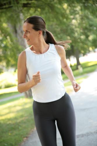 a woman is running down a street at Grand Hotel Rogaška Premium in Rogaška Slatina