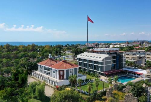 an aerial view of a building with a flag on top at Side Square Hotel Adults Only in Side
