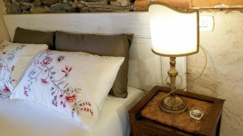 Ένα ή περισσότερα κρεβάτια σε δωμάτιο στο Guest House Al Castello