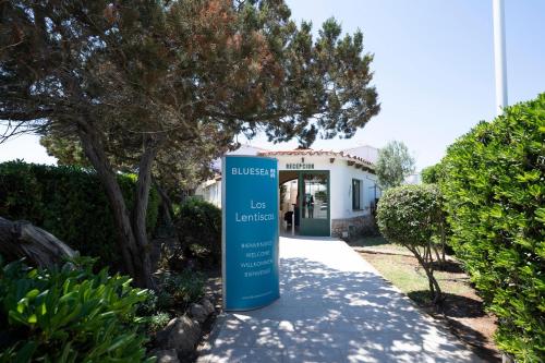 a sign in front of a building at BLUESEA Lentiscos in Cala en Blanes