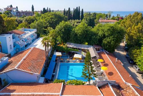 an aerial view of a villa with a swimming pool and trees at Side Temple Hotel in Side