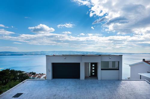 a house with a view of the water at House Dunja in Omiš