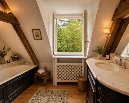 Foto de la galeria de Le Manoir de Sully - Maison d'hôtes et de campagne a Sully