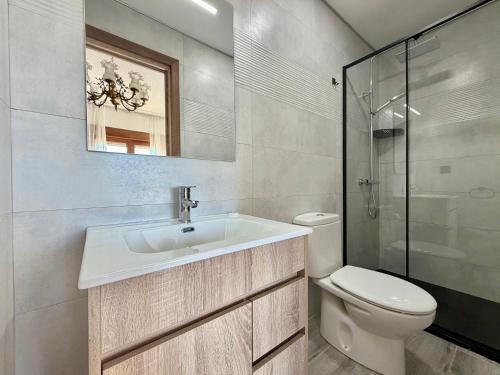 a bathroom with a sink and a toilet at El Trocador - 12805 in Ajo