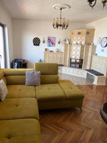 a living room with a couch and a table at Apartment Bepo in Senj
