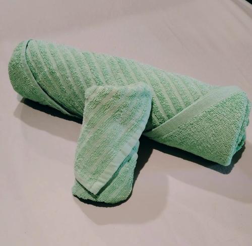 a green sock sitting on top of a table at Maison game in Villeneuve-sous-Dammartin