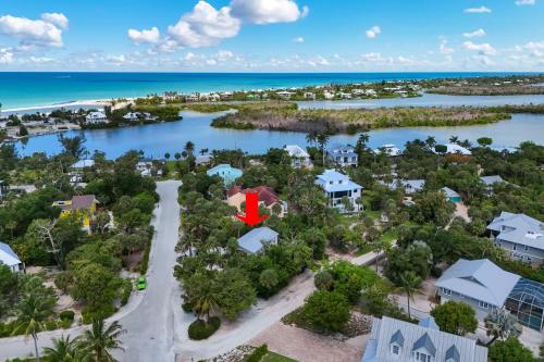 an aerial view of a resort with a red house at Pink Shell Sanibel in Sanibel