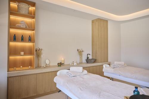 a hospital room with two beds and a counter at Sunrise Emerald in Protaras