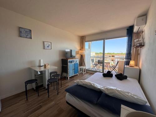 Studio Cabine climatisé avec parking privé