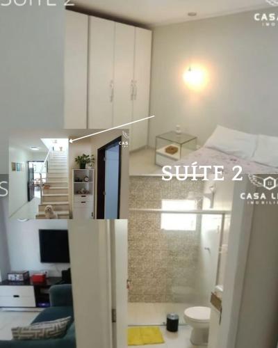 a white room with a bed and a bathroom at Casa Cris e Edinho in Garanhuns