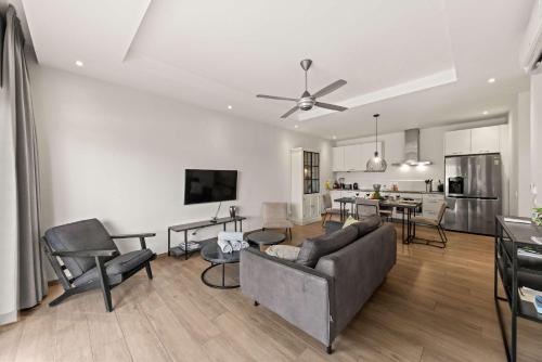 a living room with a couch and a table at Apartamento Sorbos in Dorp Sint Michiel