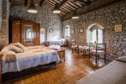 A bed or beds in a room at Agriturismo La Villa Romita