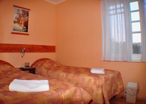 Katil atau katil-katil dalam bilik di Guesthouse Leiputrija