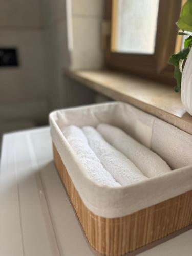 a box of towels sitting on top of a counter at Milano side house apartment in Sesto San Giovanni