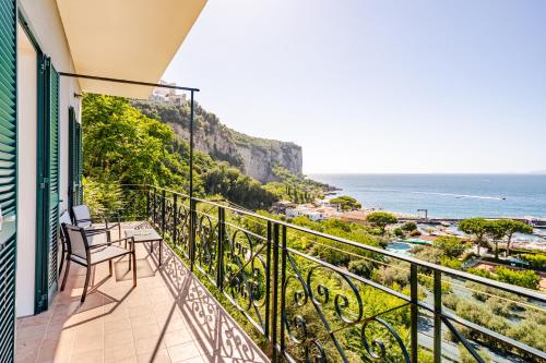 a balcony with a view of the ocean at Seventy Steps in Vico Equense