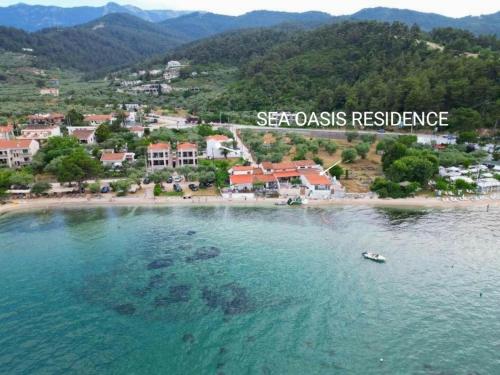 an aerial view of a beach with a resort at Sea Oasis Residence in Limenas