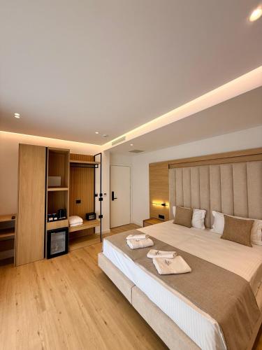Postel nebo postele na pokoji v ubytování Marisol Hotel