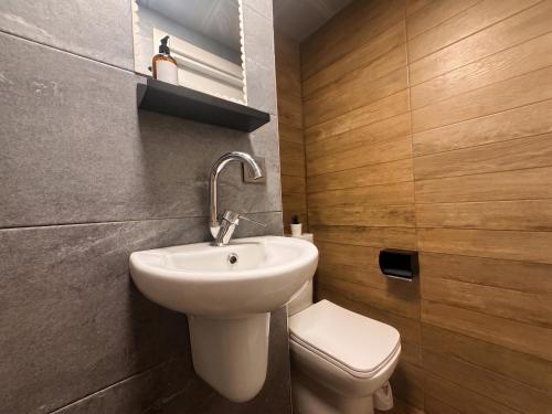 a bathroom with a sink and a toilet at Köşk Boutique Hotel - Old Town & City Center in Antalya
