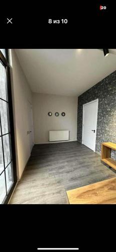 an empty room with a large room with at dom in Tbilisi City