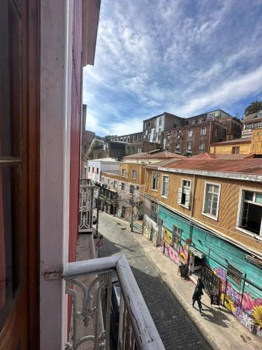 a view of a city street from a balcony at Da Vinci in Valparaíso