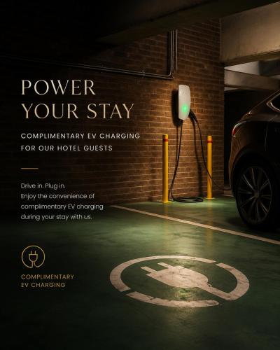 a poster of a parking garage with a sign at Ramada by Wyndham Diplomat Canberra in Canberra