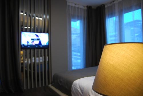 Μια τηλεόραση ή/και κέντρο ψυχαγωγίας στο The City Suites