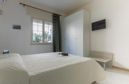 TV a/nebo společenská místnost v ubytování B&B Isole Dello Stagnone