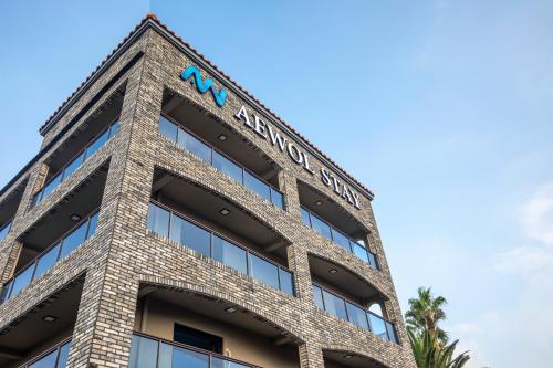 a building with the amazonazonazon sign on it at Aewol Stay in Jeju Hotel&Resort in Jeju