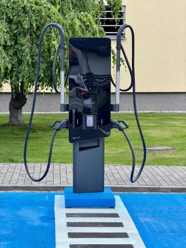 a pay station at a bus stop in a park at Buly Aréna in Kravaře