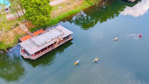 an aerial view of a boat in the water at Pung-Waan Resort & Spa in Kanchanaburi City