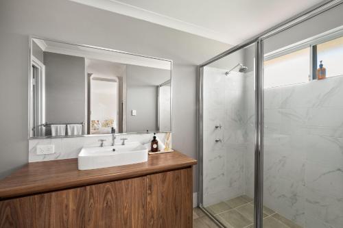 a bathroom with a sink and a shower at Rileystone in Margaret River Town