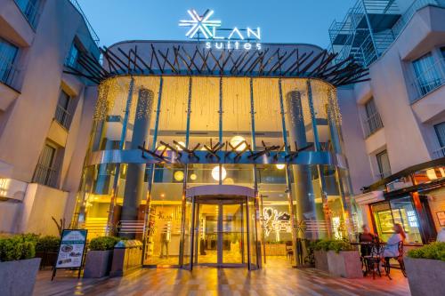 an entrance to a building with a revolving door at Alan Suites in Edirne