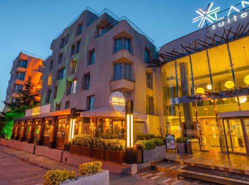 a hotel with a building in front of it at Alan Suites in Edirne