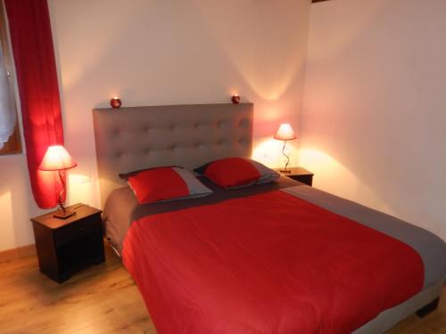 Ein Bett oder Betten in einem Zimmer der Unterkunft Gîte Pinot