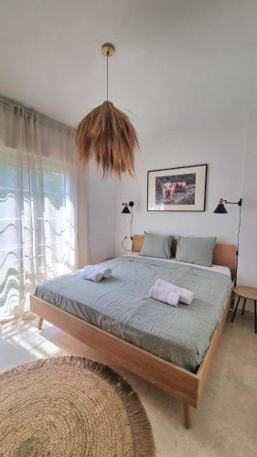 3-bedroom HOUSE with a private sunny garden and community pool in Marbella near Puerto Banús