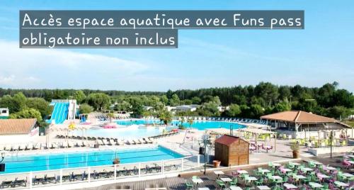 an image of a large pool at a resort at Bungalows climatisés en 3 ou 4ch - jusqu'à 18 voyageurs - mh732 3ch ou mh828 4ch Biscarrosse Lake-proche océan in Gastes