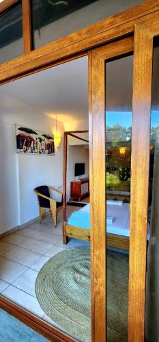 a room with a view of a living room at Diani White Sands in Diani Beach