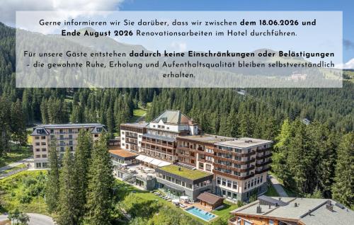 a rendering of a building with trees in the background at Waldhotel Arosa in Arosa