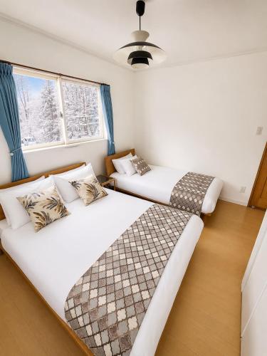 HAKUBA House LuckyStar5 next to shuttle bus station ,711 ,restaurants Modern Chalet