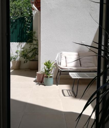 Apartamento encantador com pátio